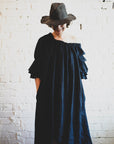 A gorgeous detailed french linen button bluson dress by Lorena Laing. Made in Melbourne featuring stunning french linen and the unique styling a signature of the Lorena Laing look.
