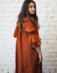 A gorgeous detailed french linen button bluson dress by Lorena Laing. Made in Melbourne featuring stunning french linen and the unique styling a signature of the Lorena Laing look.