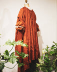 A gorgeous detailed french linen button bluson dress by Lorena Laing. Made in Melbourne featuring stunning french linen and the unique styling a signature of the Lorena Laing look.