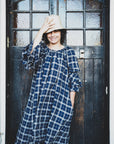 A gorgeous detailed french linen button bluson dress by Lorena Laing. Made in Melbourne featuring stunning french linen and the unique styling a signature of the Lorena Laing look.